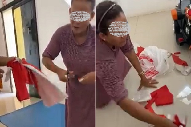 Sebuah video yang merekam aksi seorang ibu-ibu tengah menggunting bendera Merah Putih beredar viral di media sosial Instagram. Foto/SINDOnews
