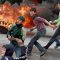 Remaja Palestina dalam satu aksi melawan pendudukan Israel.