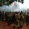 Prajurit TNI saat membubarkan massa aksi di area Patung Kuda