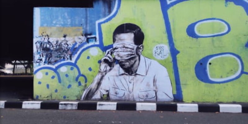 Muncul Mural Wajah Mirip Jokowi Tertutup Masker, Warganet: Jangan Sampai Faldo Maldini Tahu!